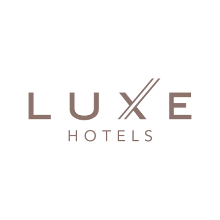 Luxe Hotels logo with stylized letter X