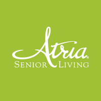 A lime green background with white text that reads 'Atria Senior Living'