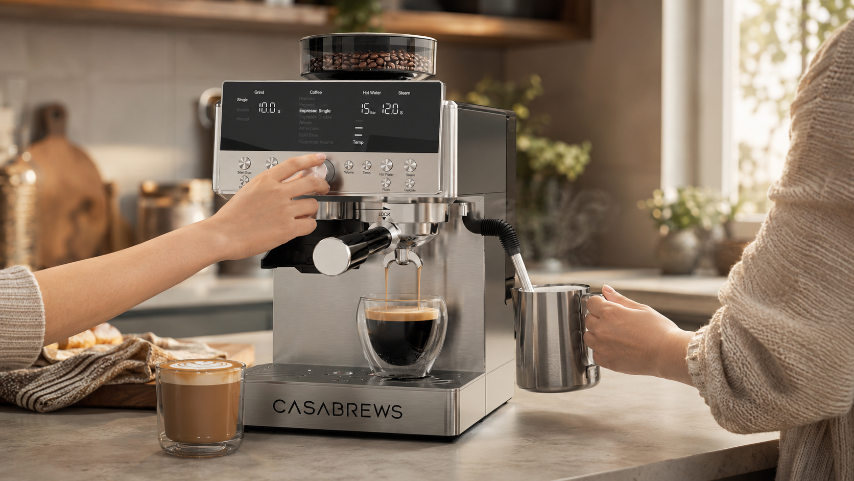 CASABREWS Marenza espresso machine brewing espresso while a person adjusts the controls and holds a milk frothing pitcher in a warm home kitchen.
