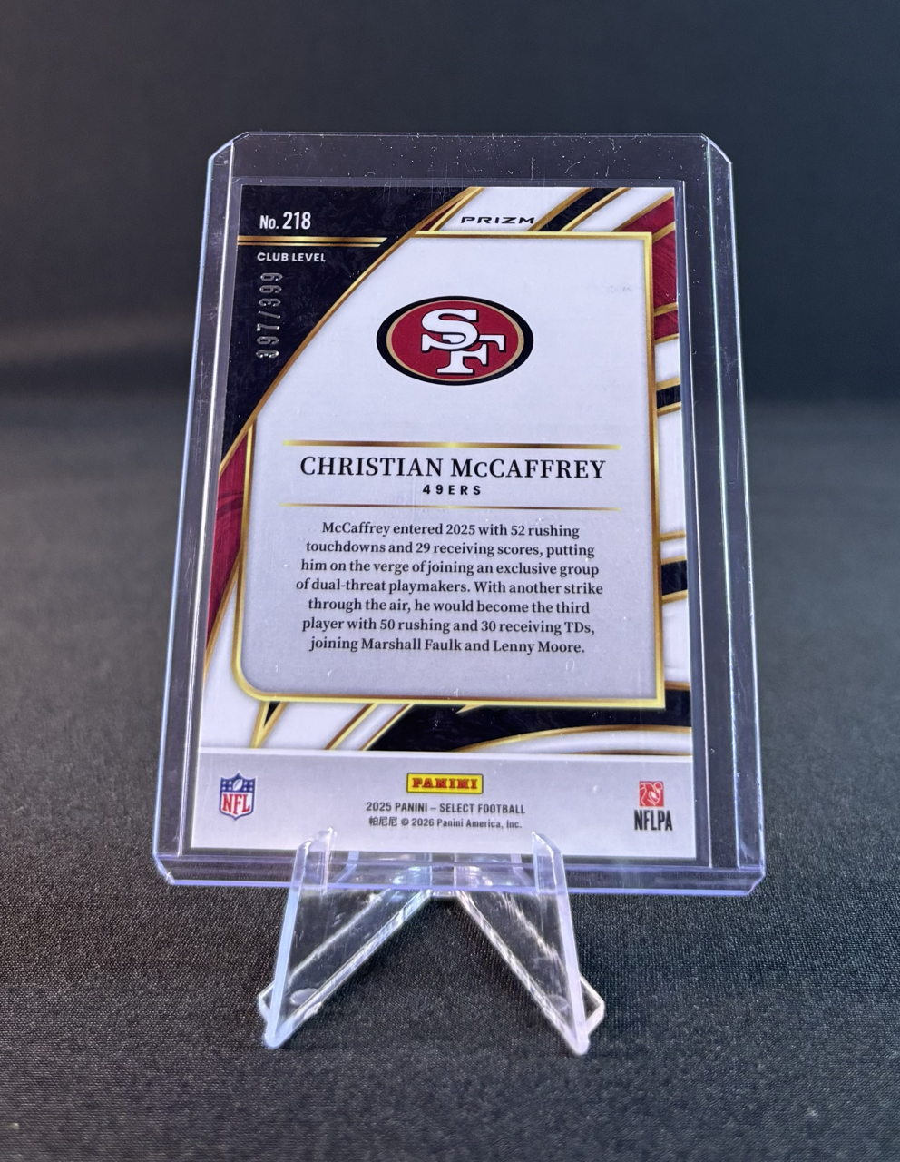 Football trading card featuring Christian McCaffrey, with team logo, stats, and a brief biography.