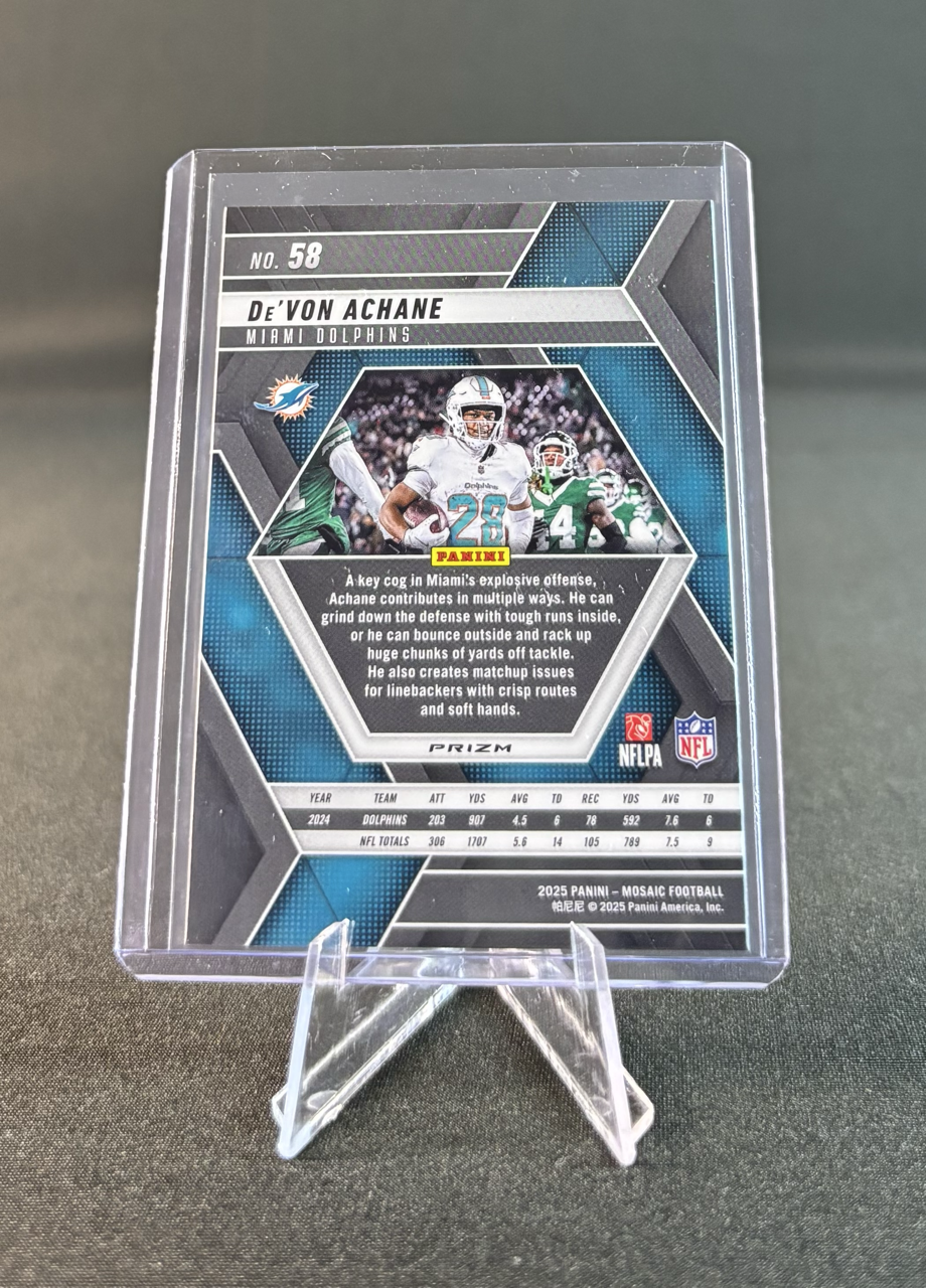 Football trading card featuring De'Von Achane of the Miami Dolphins, with a header displaying his name and team, a photograph of him in uniform holding a football, team graphics, and statistical data at the bottom.