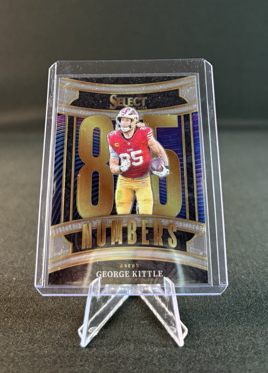 Holographic football trading card of George Kittle in his 49ers uniform, featuring the number 80 and the title 'Select 2025' with gold accents.