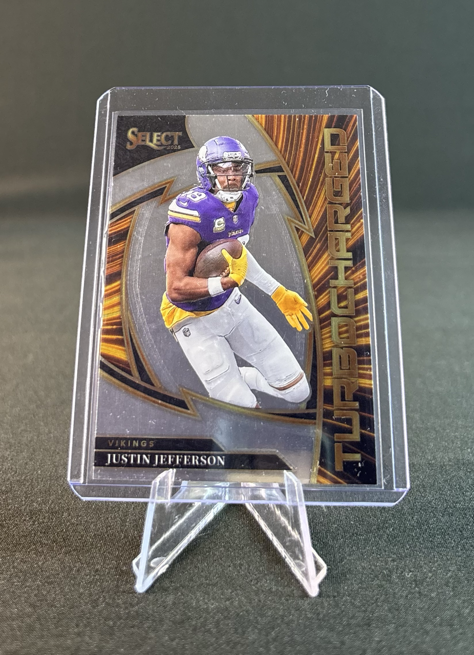 Football trading card of Justin Jefferson in a purple Vikings uniform running with a football.