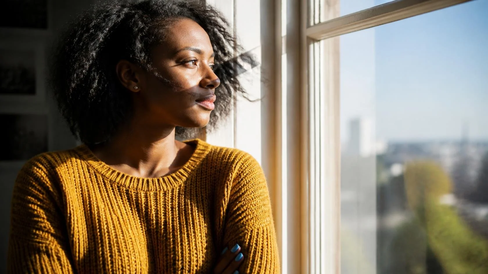 Black pregnant woman in contemplation