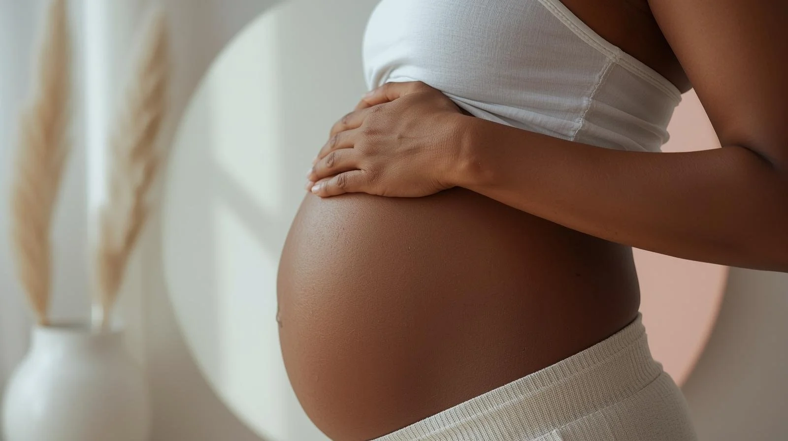 black pregnant belly, rubbing belly