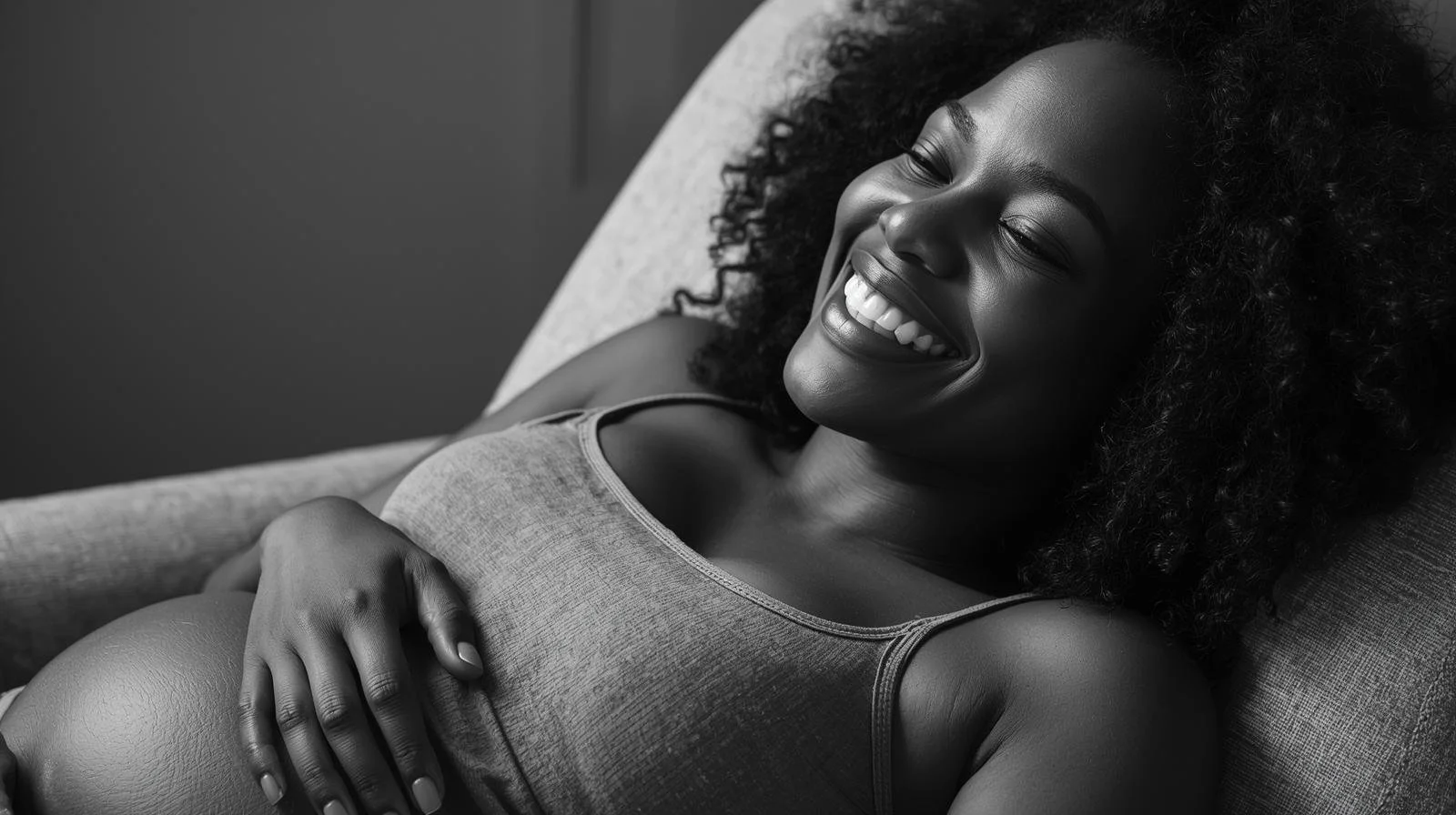 black pregnant woman, joyful, happy, excited