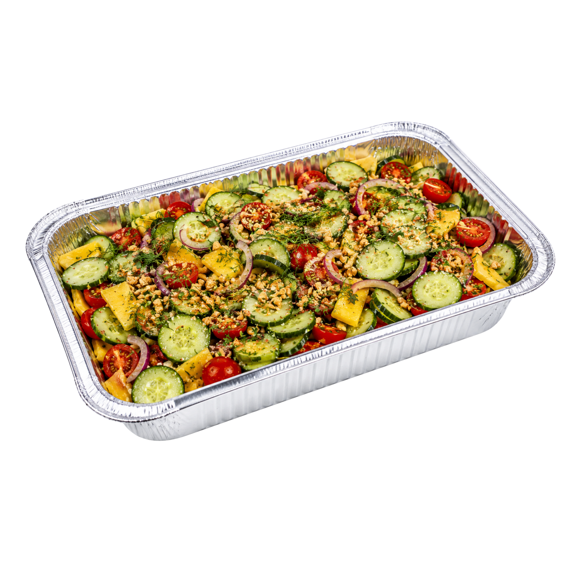 Aluminum tray filled with a vegetable salad containing cucumbers, cherry tomatoes, red onion slices, yellow bell peppers, chopped nuts, and herbs.
