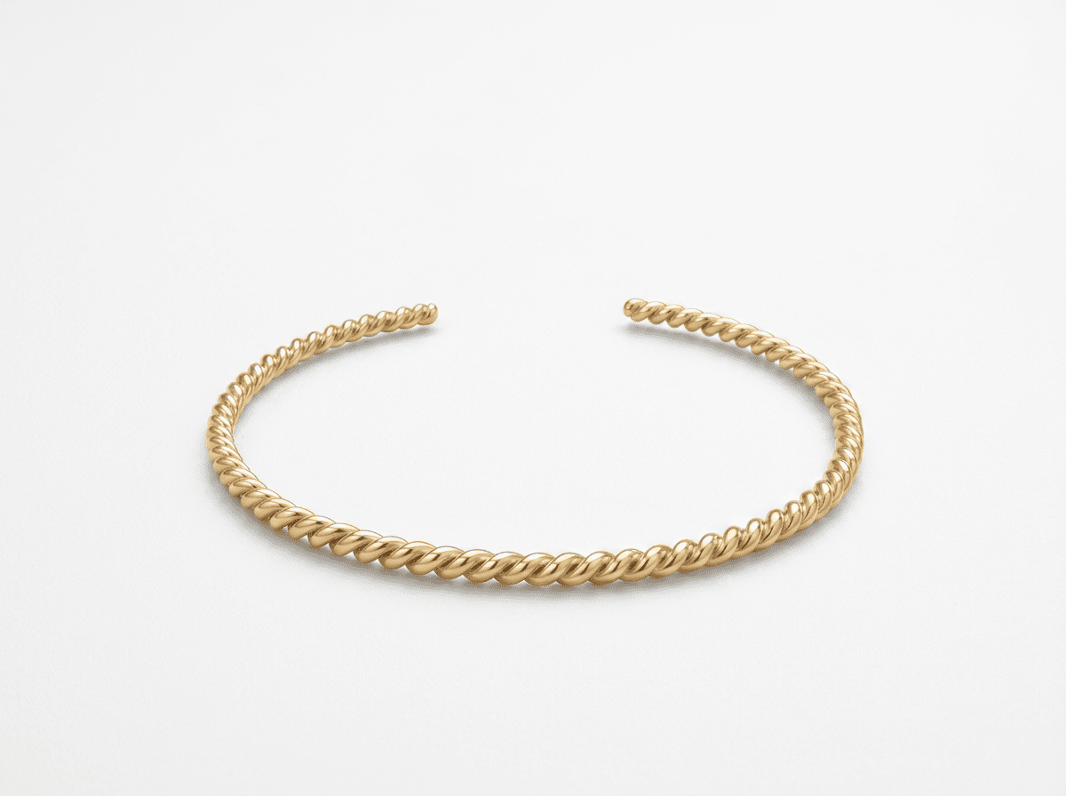 THE GOLD TWIST BANGLE
