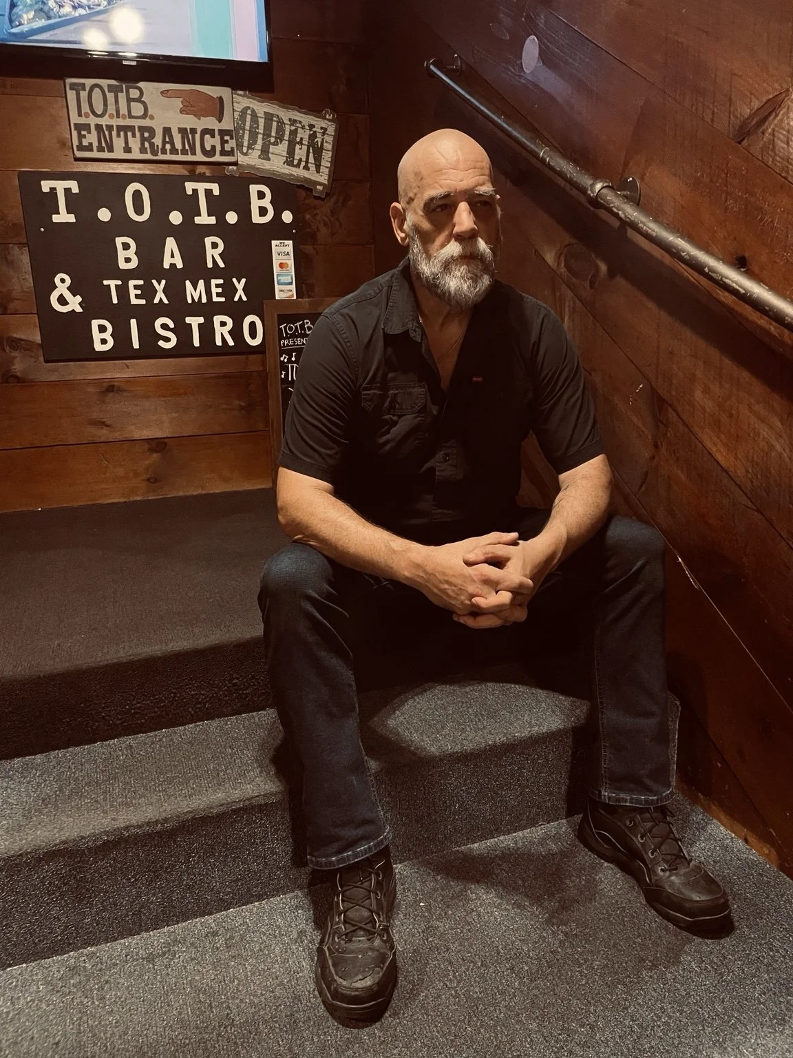 Larry Holly backstage at a North Country music venue