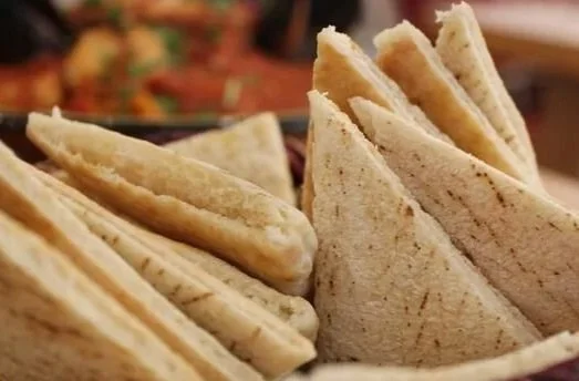 Close-up of stacked pita triangle slices