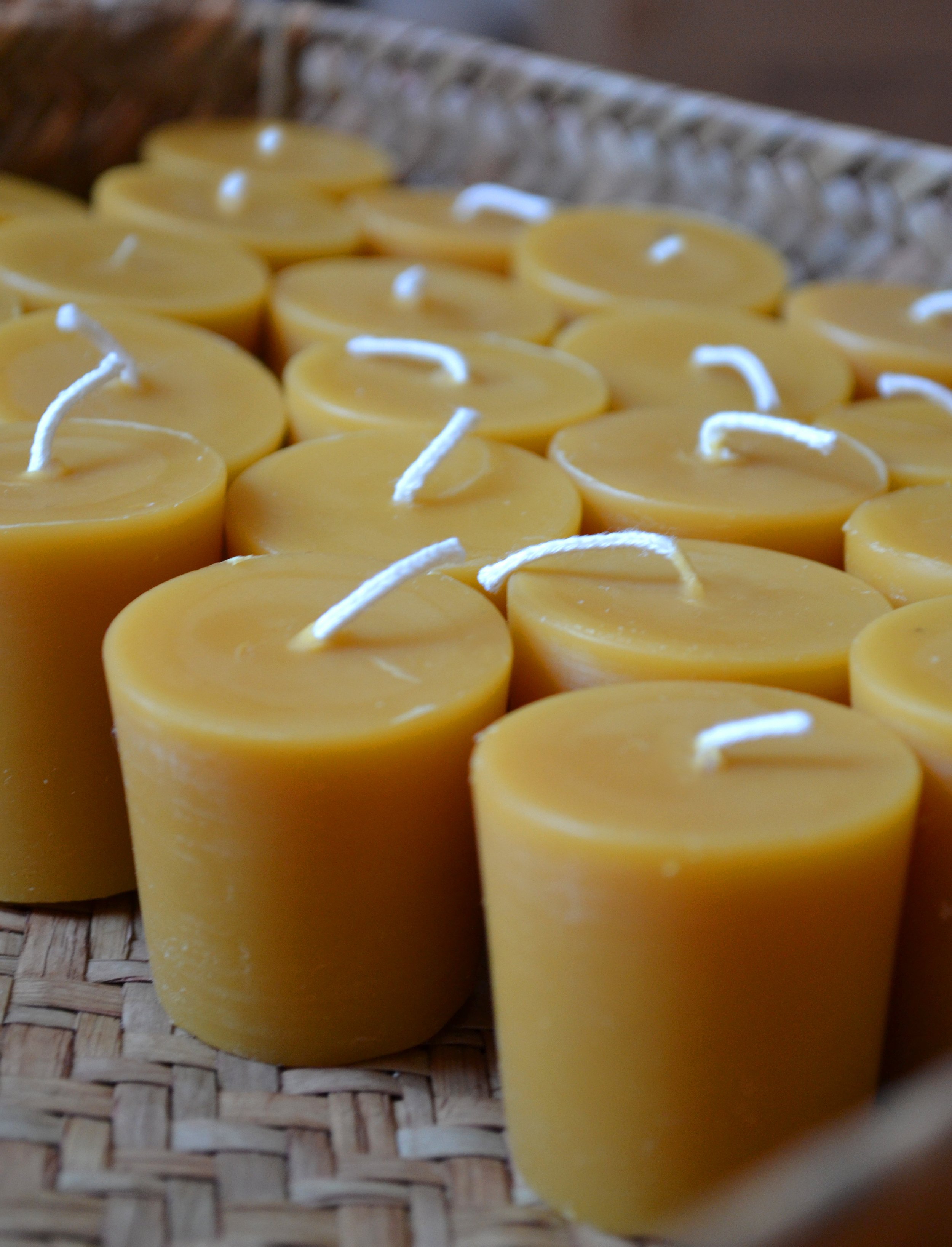 Pure beeswax unscented votive candles, made in Boston with natural cotton wicks.