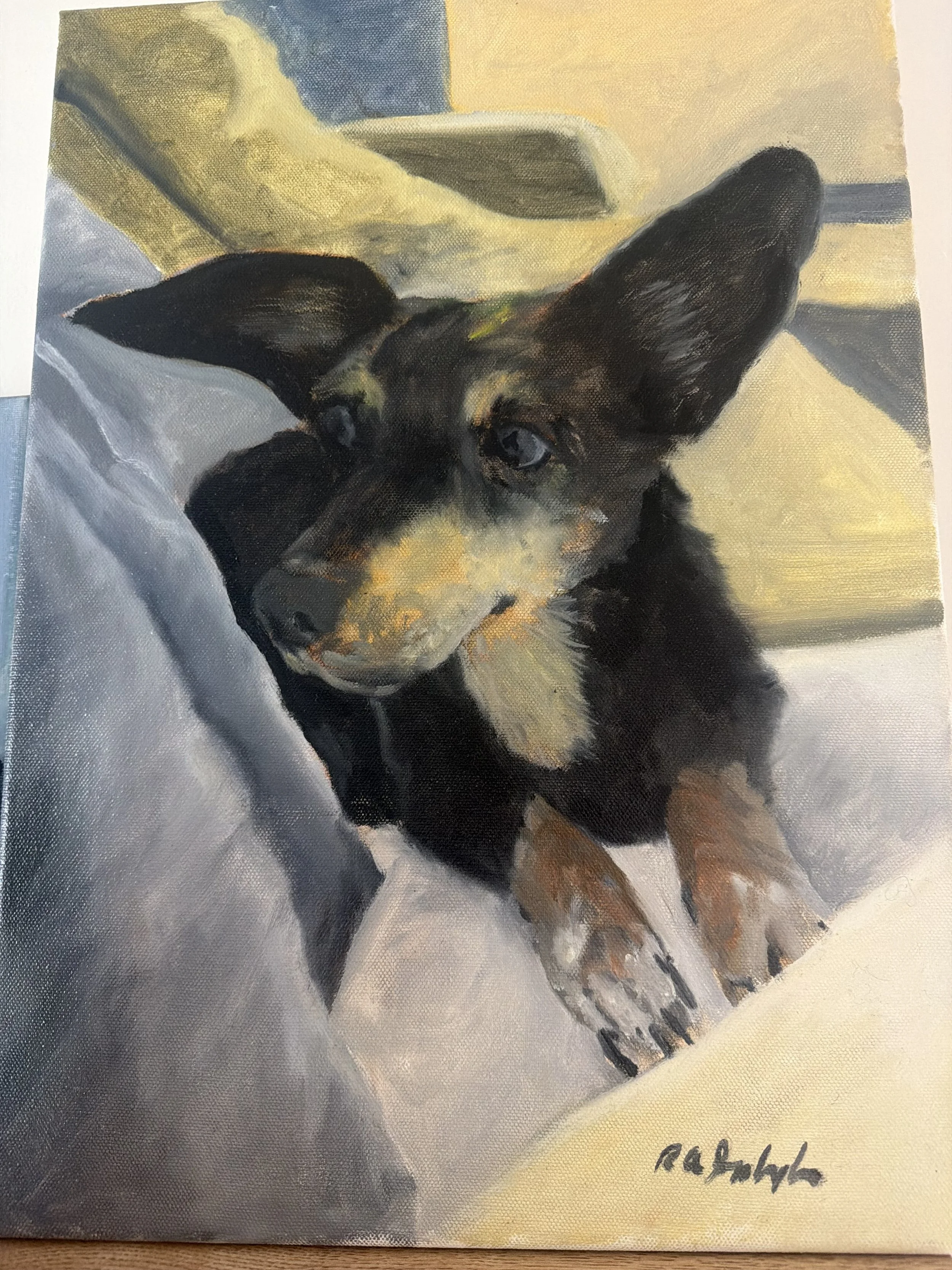 A painting of a black and tan dog with large ears, lying on a white blanket or sheet, with a blue and beige background.