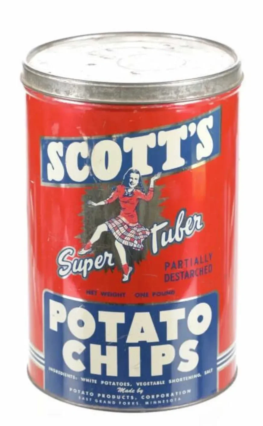 Can of Scott's Super Tuber potato chips with a red background, featuring a dancing woman in a plaid skirt and red top, over the text 'Super Tuber' and 'Potato Chips'.