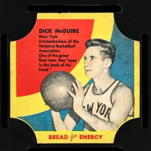 Vintage basketball team promotional sign featuring Dick McGuire from New York, with an illustration of him in a New York basketball uniform holding a basketball. The sign includes a quote about McGuire and the phrase 'Bread for Energy' at the bottom.