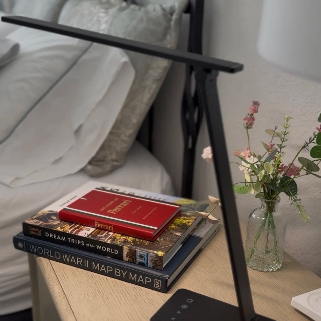 LEPRO LED desk lamp styled on a bedside table with books and flowers