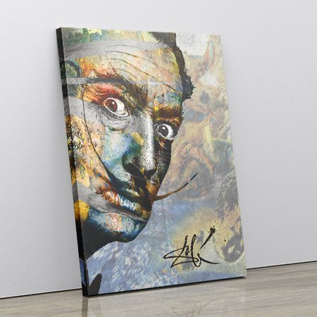 A colorful abstract portrait of a person's face with wide eyes, painted on canvas leaning against a gray wall.