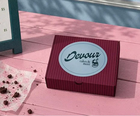 Branded packaging mockup for Devour Cakes