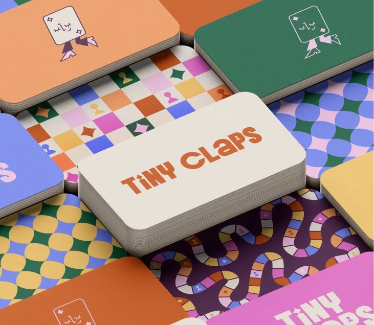 Tiny Claps print materials mockup