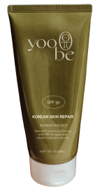 YooBe skincare product in olive green tube