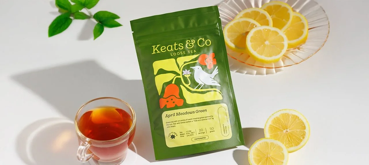 Keats & Co loose tea packaging with cup of tea and lemon slices surrounding