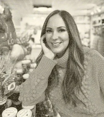 Headshot of Andrea Zembilis, founder of Sugar Rush
