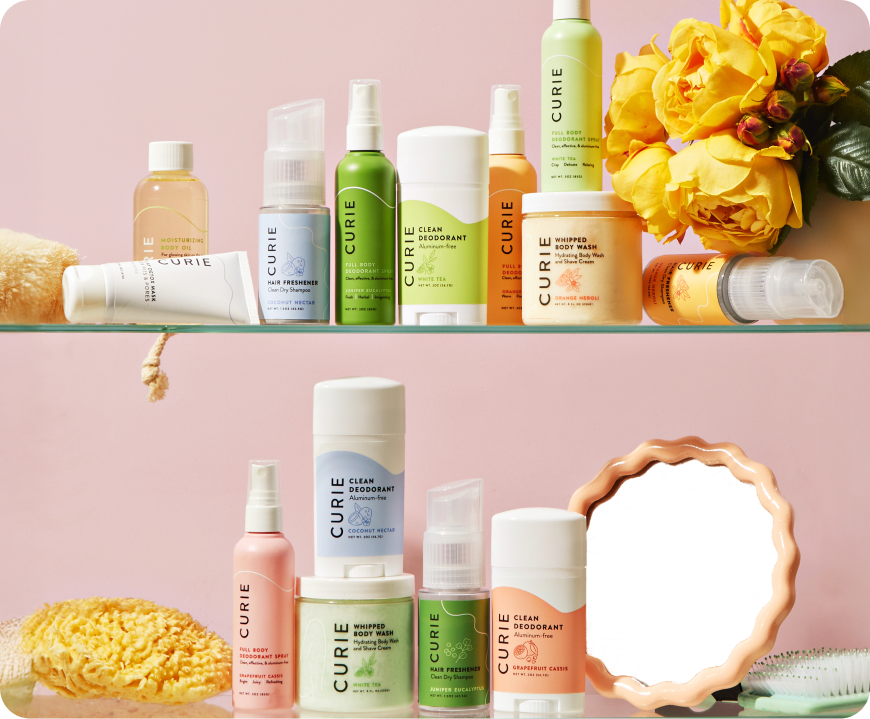 Curie personal care items styled on shelves with bathroom accessories