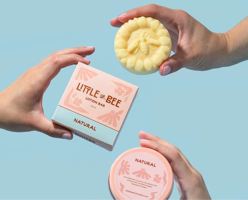 People holding Little Bee lotion bar and product pacakaging