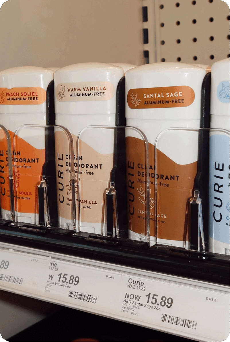 Curie deodorant packaging design on store shelves
