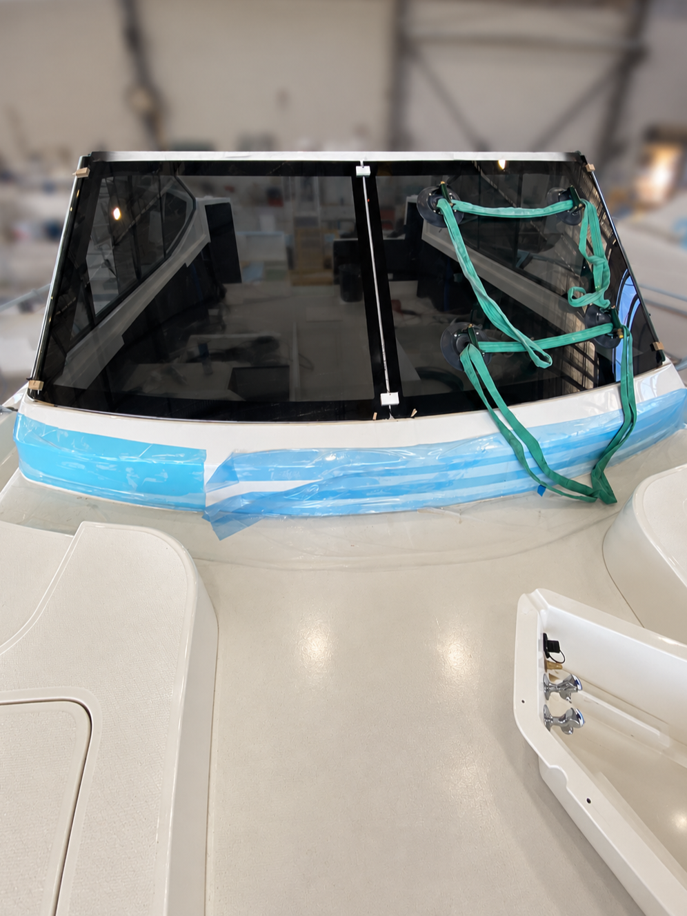 Motor yacht windscreen fitment and installation during production boatbuilding by Gold Coast shipwright