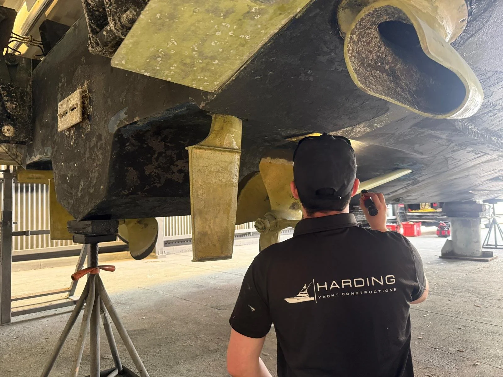 Bailey Harding of Harding Yacht Constructions carrying out a vessel inspection on the Gold Coast