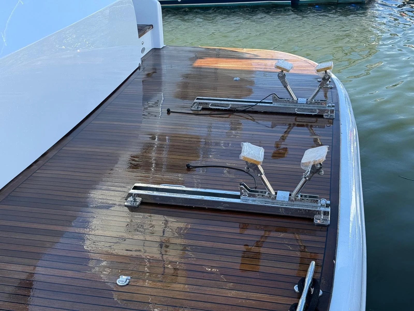 Custom tender storage rack modification and gunwale rub strip installation on a 93' warren yacht