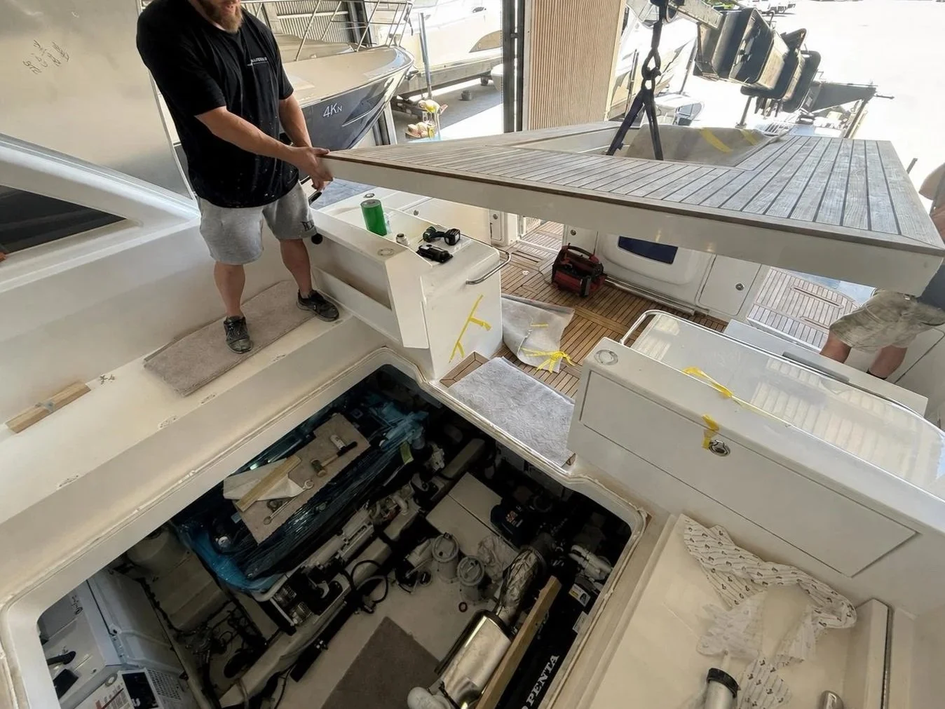 Mezzanine floor removal and reinstallation on a Riviera 505 SUV during an engine replacement