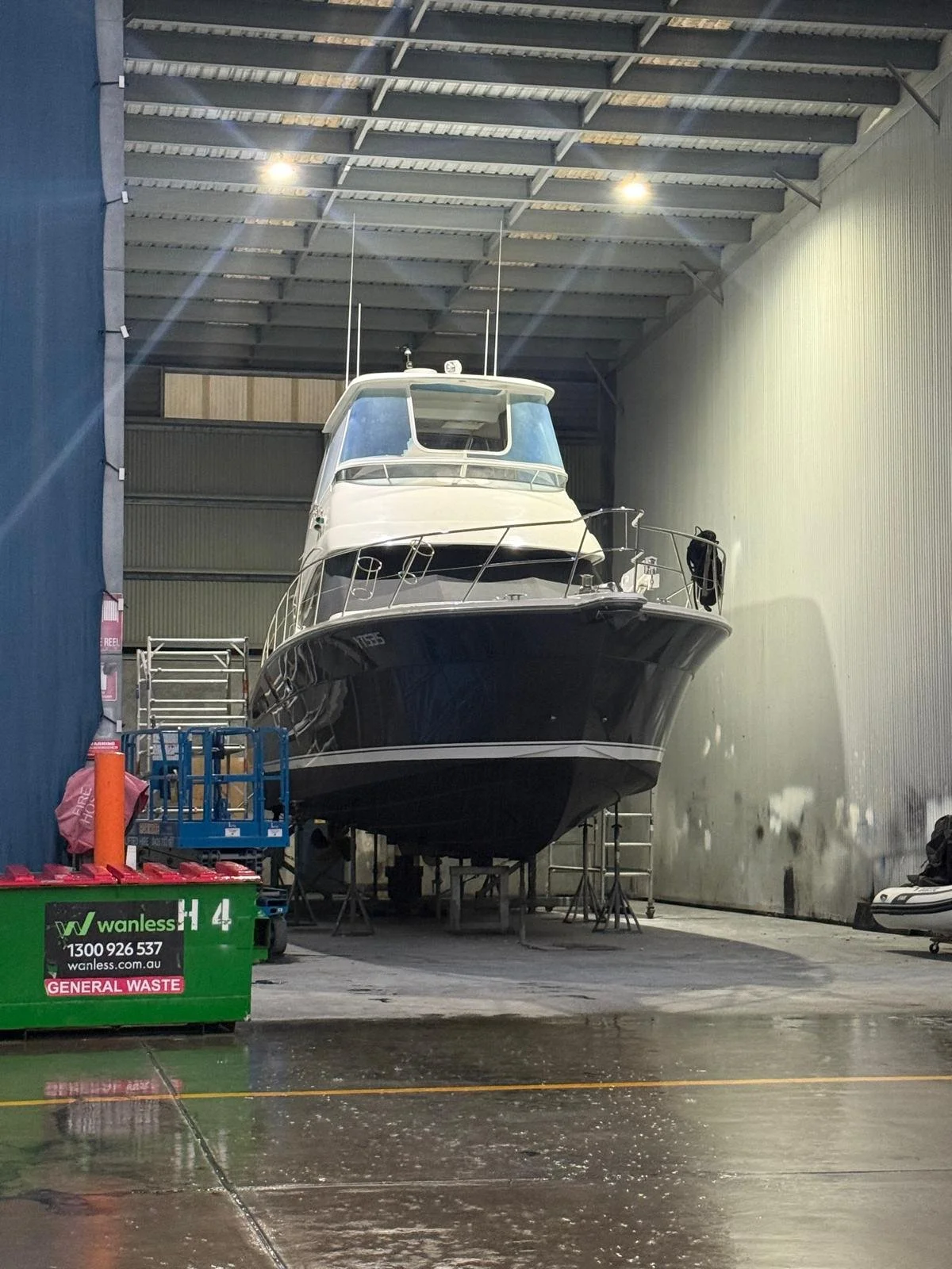 Riviera flybridge motor yacht hauled out for maintenance and refit works at Boat Works, Gold Coast