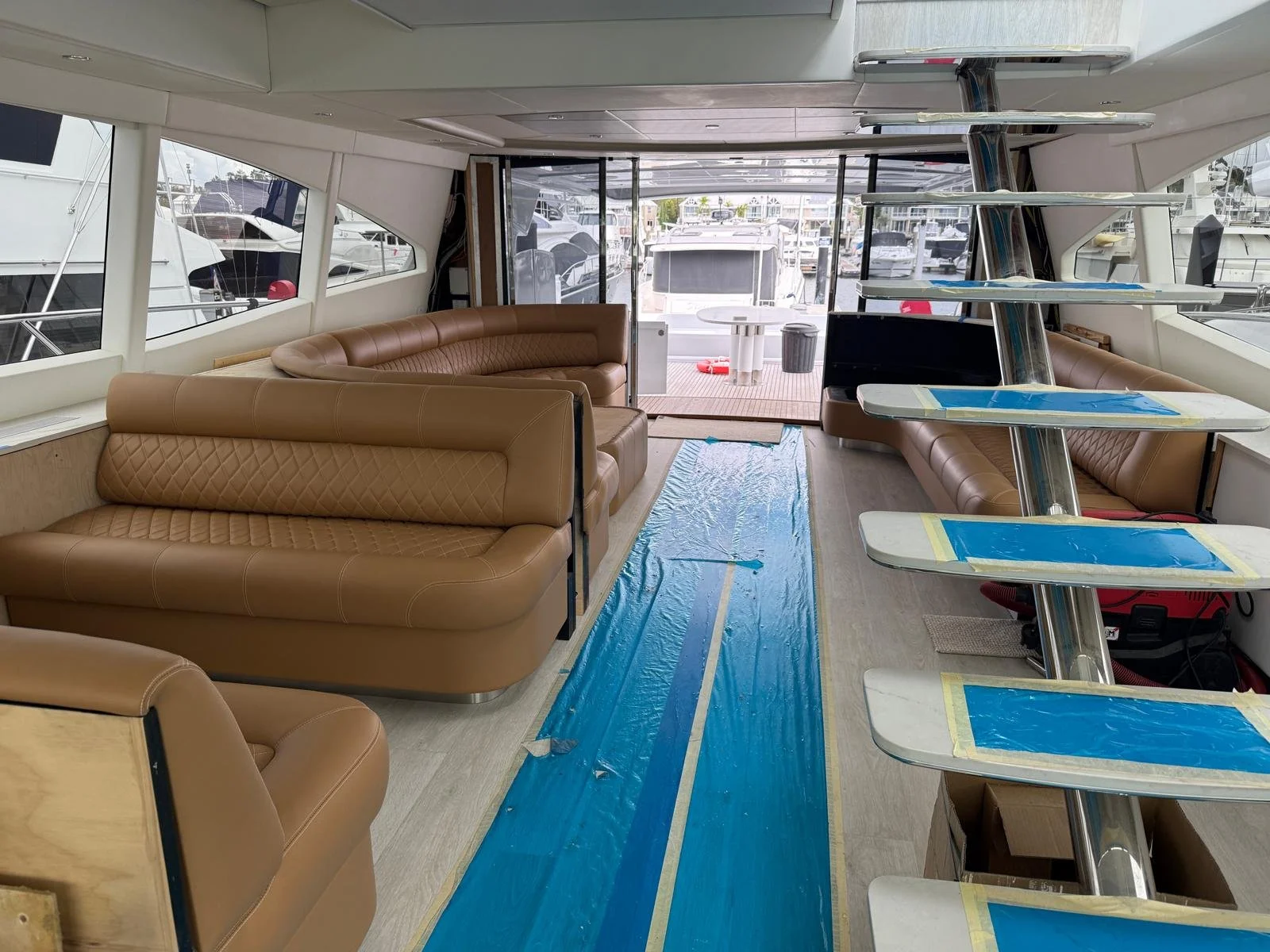 Saloon interior refit nearing completion aboard a 93' Warren luxury yacht