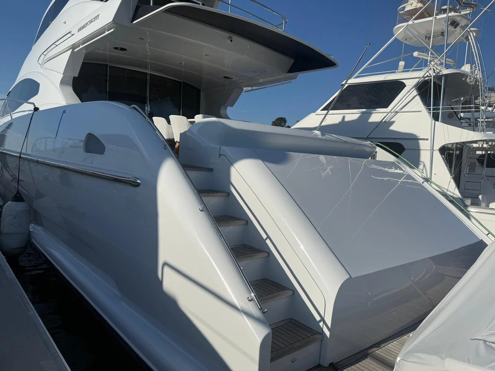 93' Warren luxury yacht exterior after detailing, with clean polished gelcoat finishes on the Gold Coast