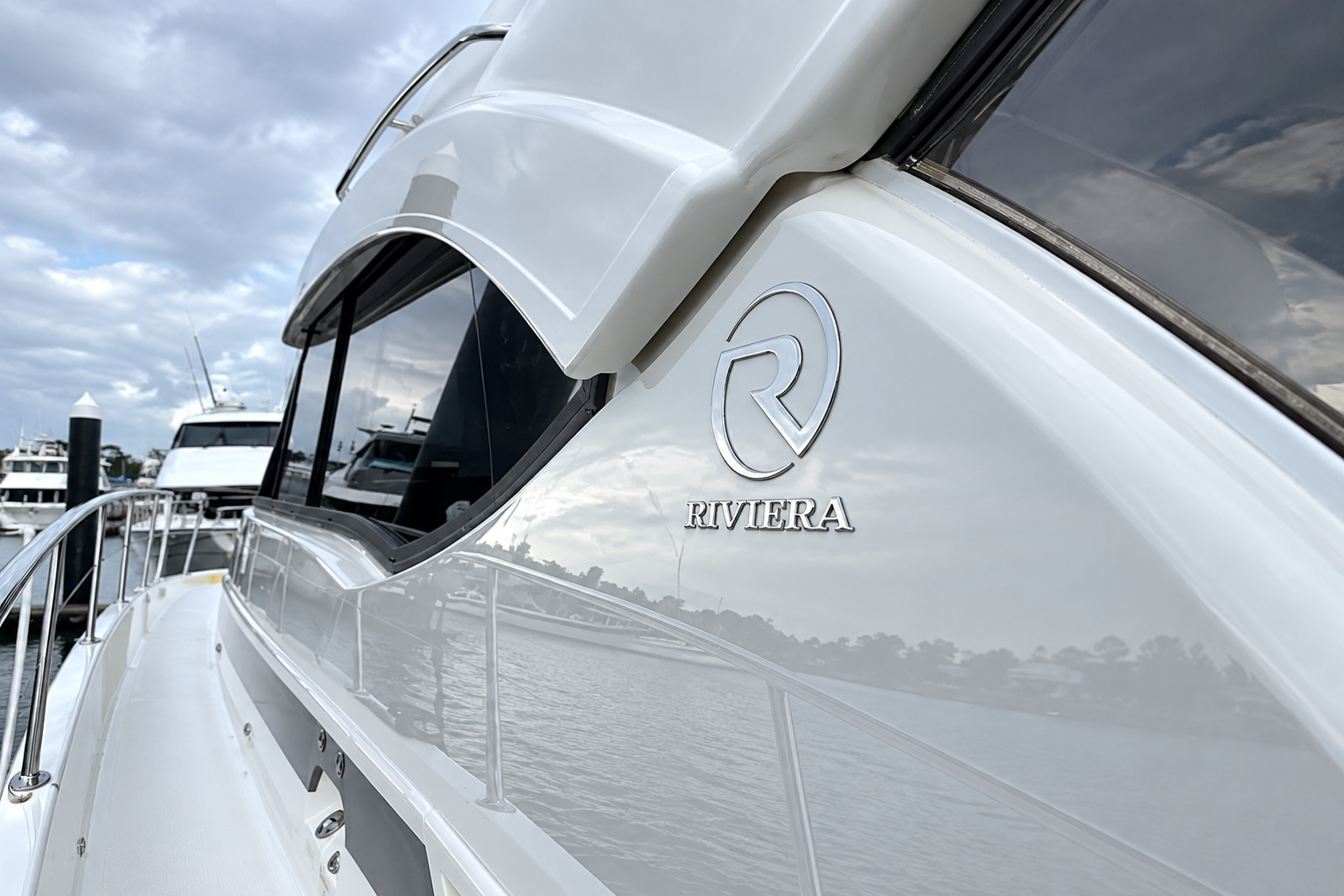 Riviera motor yacht following professional wash, cut and polish as part of boat detailing works on the Gold Coast