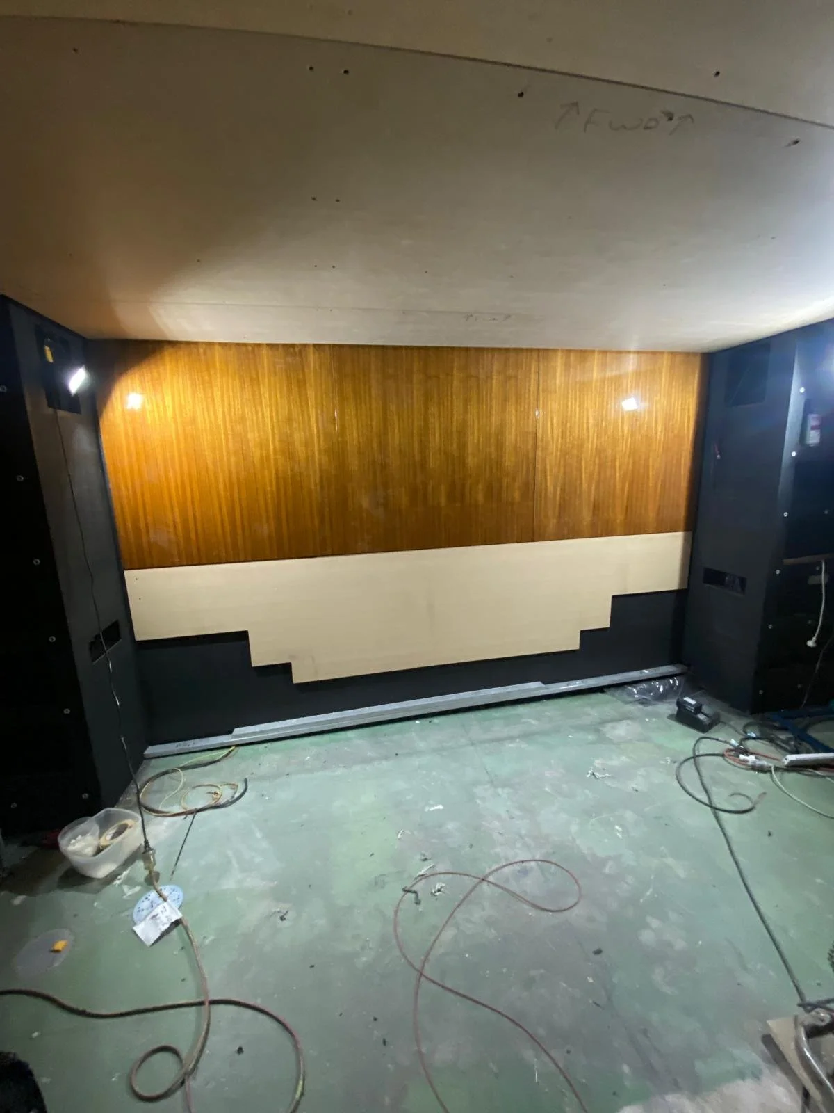 Master cabin feature wall and interior fit-out in progress aboard a luxury motor yacht