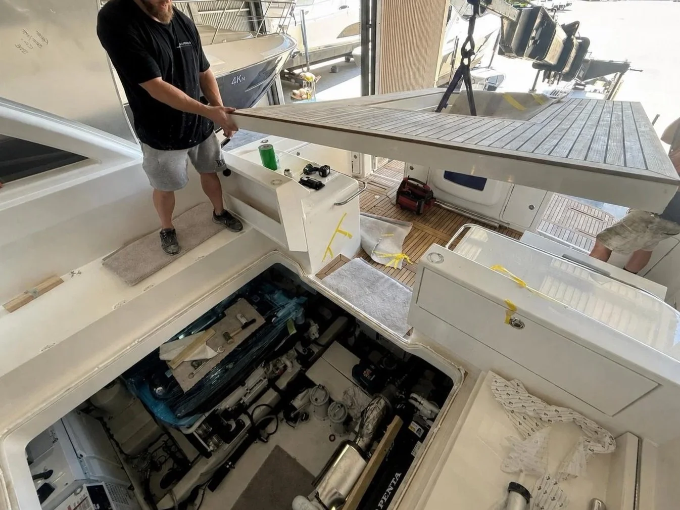 Mezzanine floor removal and reinstallation on a Riviera 505 SUV during an engine replacement