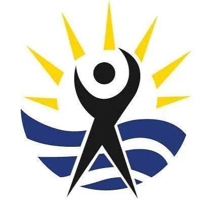 A stylized abstract human figure with a black body, a black circle head, raised arms, standing on blue lines, with yellow rays emanating behind it, resembling a sun or light.