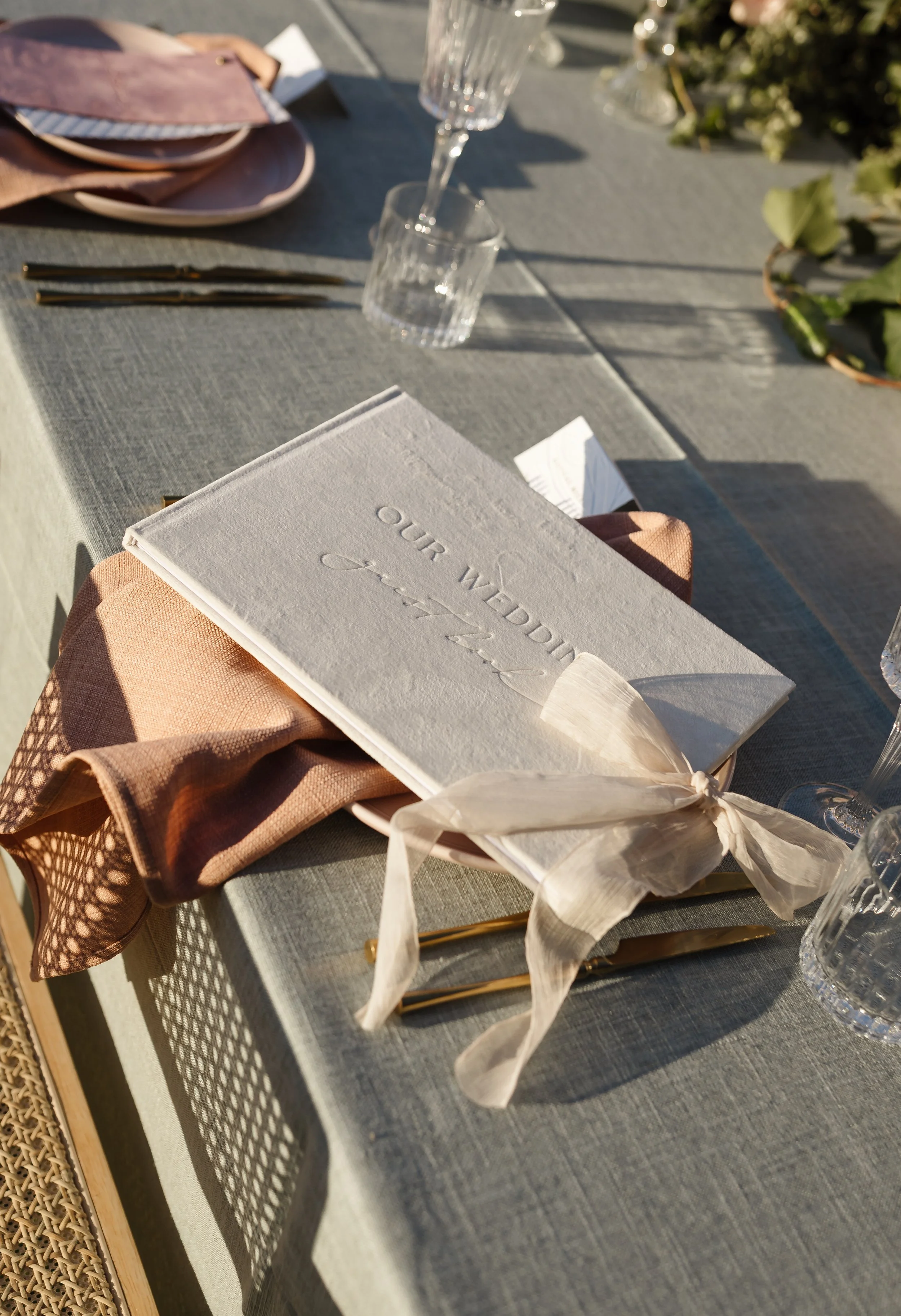 wedding-vow-book-ribbon-tablescape.jpg