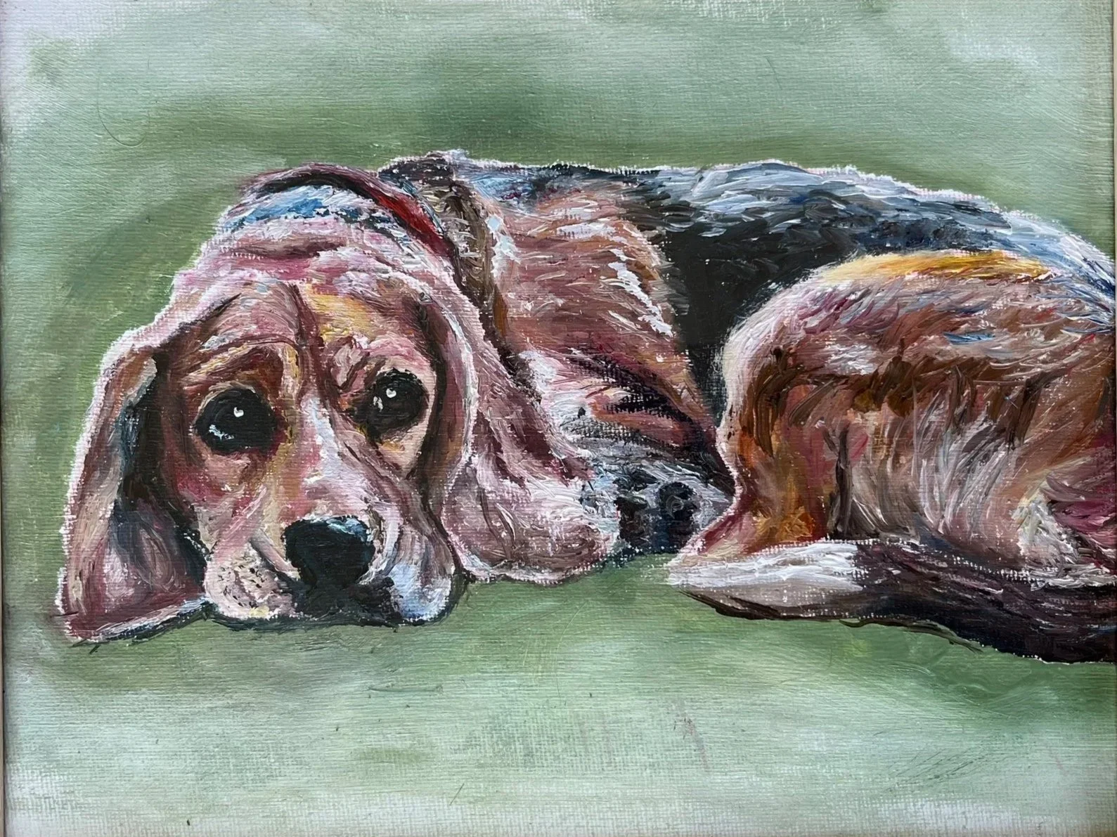 A painting of a beagle pet dog relaxing