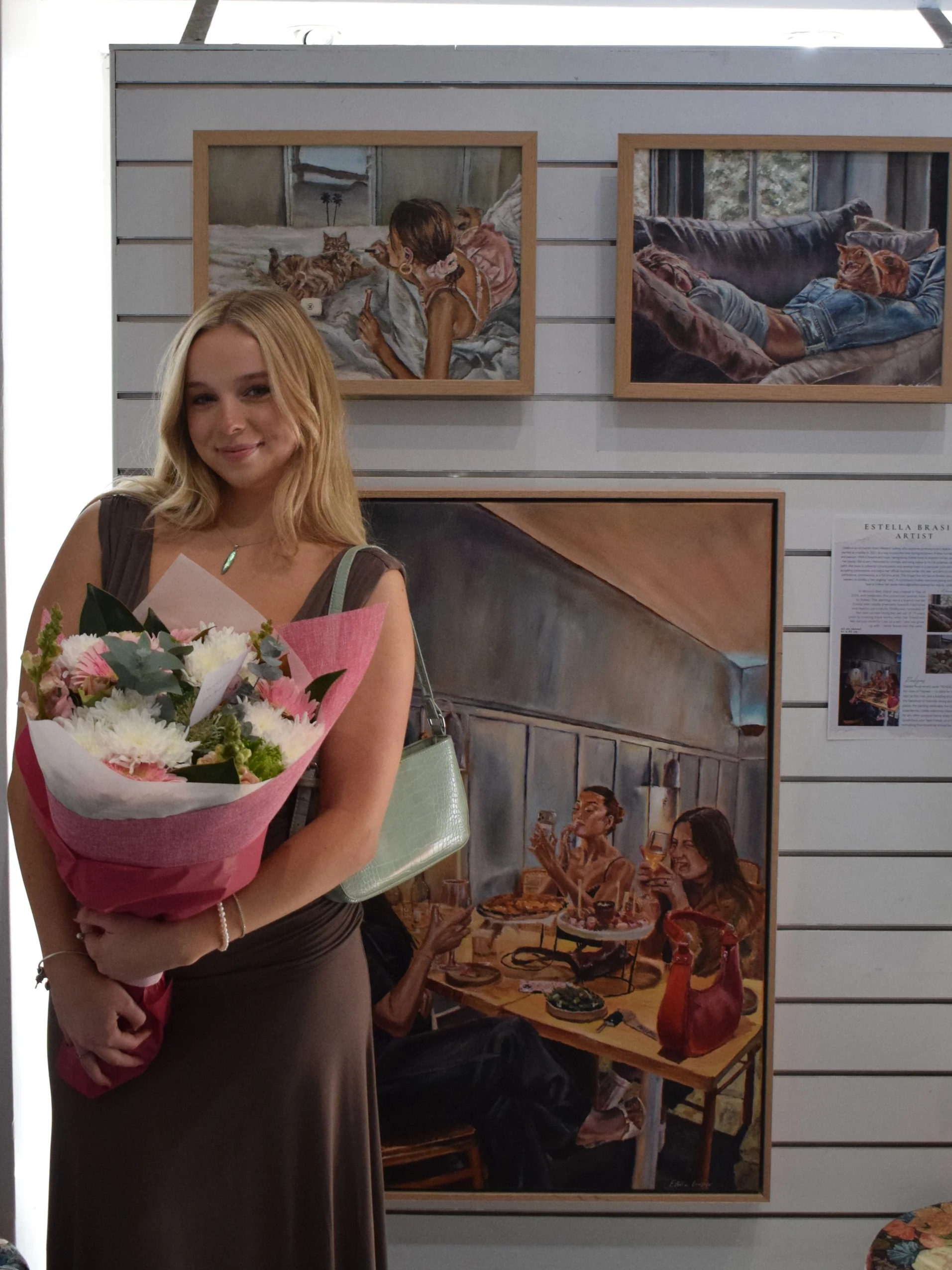 Estella Brasier - young artist at her exhibition in an art gallery in the Penrith, New South Wales.