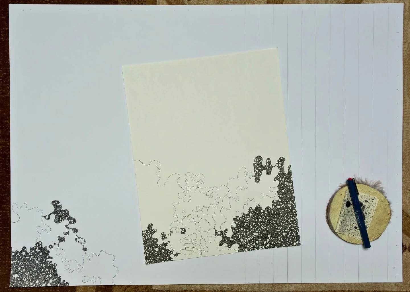 Studio process view of contemporary minimalist and process artist Abdushakur developing an ink accumulation drawing on archival board, featuring dense stippling, cellular line work, and drafting instruments.