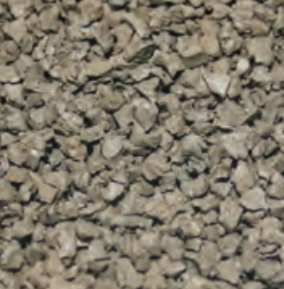 Close-up of small gravel or crushed stone on the ground