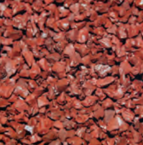 Close-up of reddish-brown gravel or crushed stone.