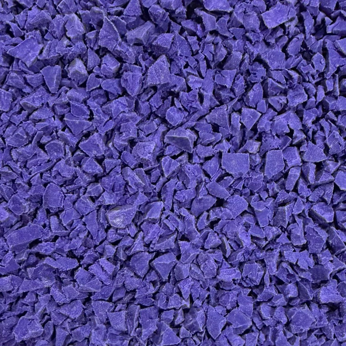Purple crumbled rock or mineral fragments.