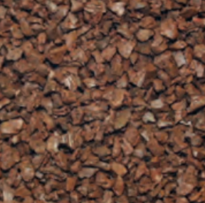 Close-up of brown mulch or wood chips.