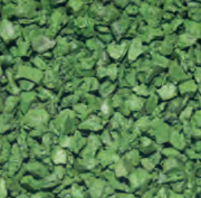 Close-up of green cut herbs, likely parsley or cilantro.