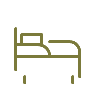 Line drawing of a bed with a pillow and headboard