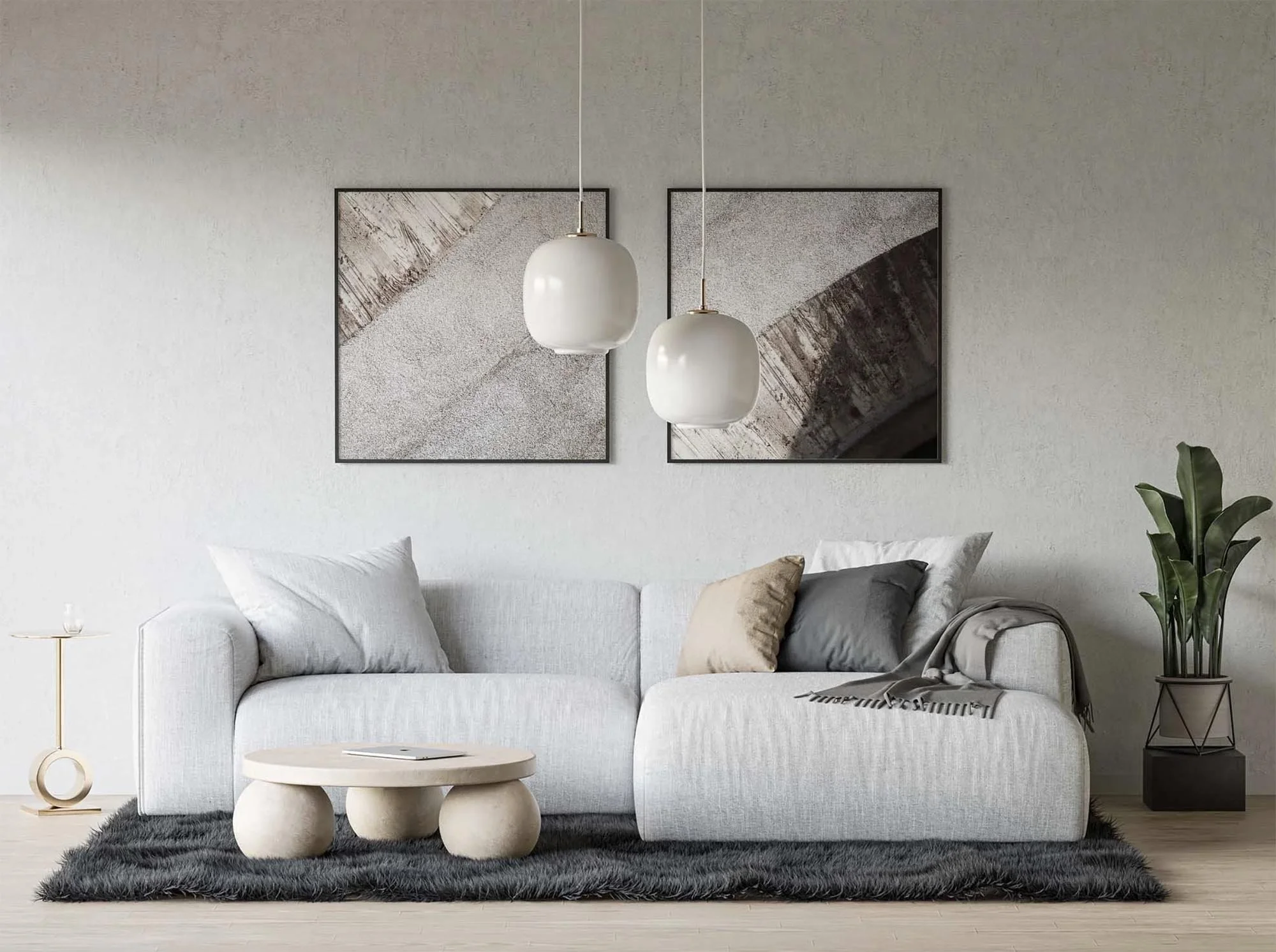 Soggiorno moderno con divano bianco, tavolino rotondo, luci pendenti bianche, quadri astratti alle pareti, tappeto nero, pianta verde in vaso e lampada laterale gialla.
